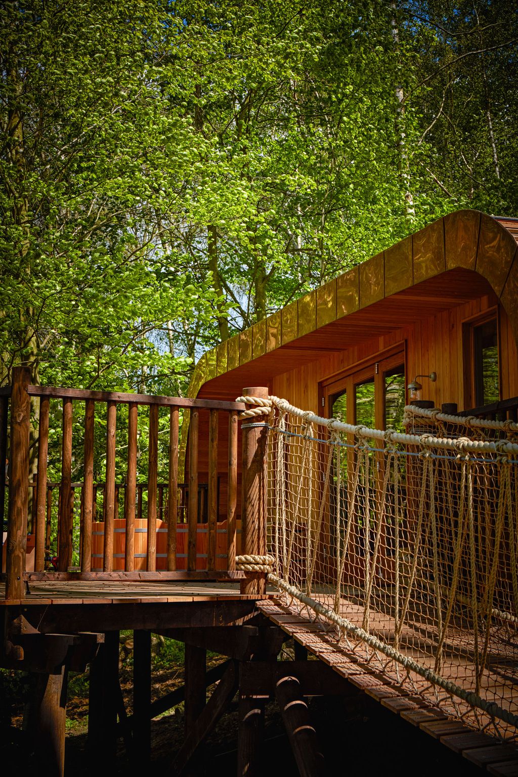 Image may contain Building Housing House Cabin Tree House Banister and Handrail