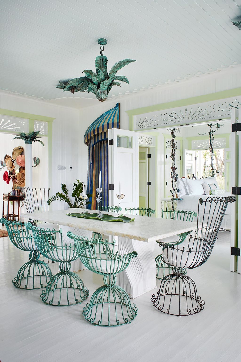 Image may contain Furniture Chair Indoors Room Dining Room and Plant