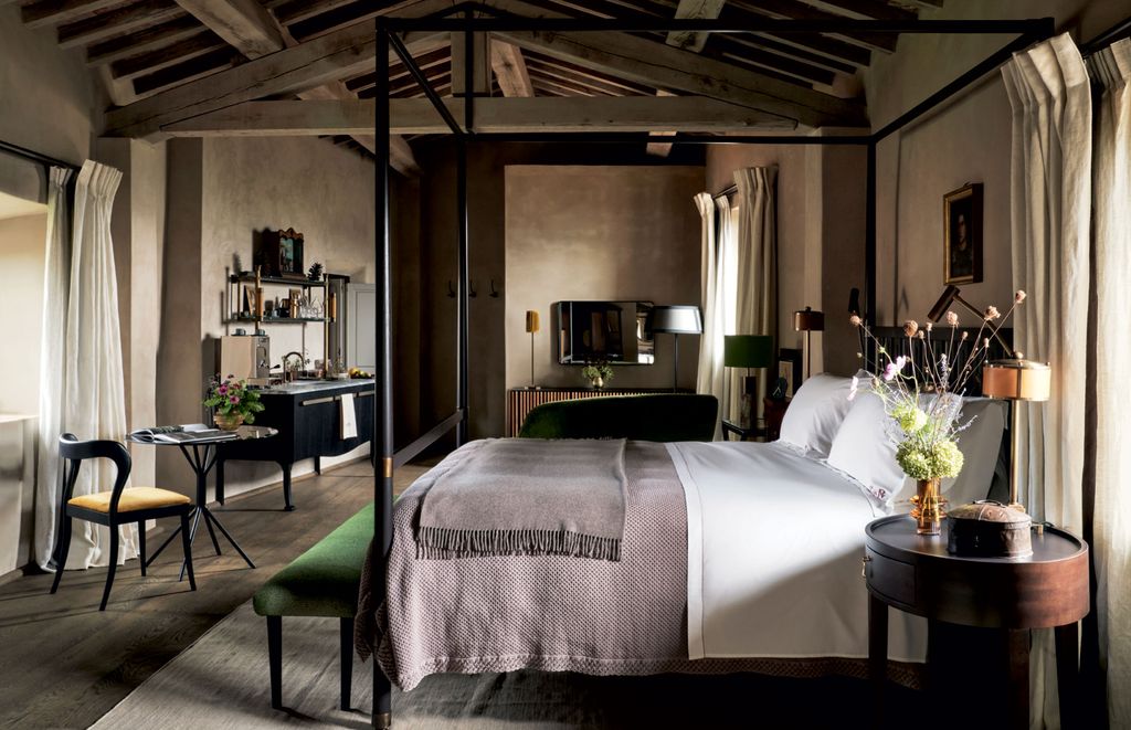 Image may contain Furniture Chair Indoors Interior Design Room Plant Bedroom Living Room Flower and Blossom