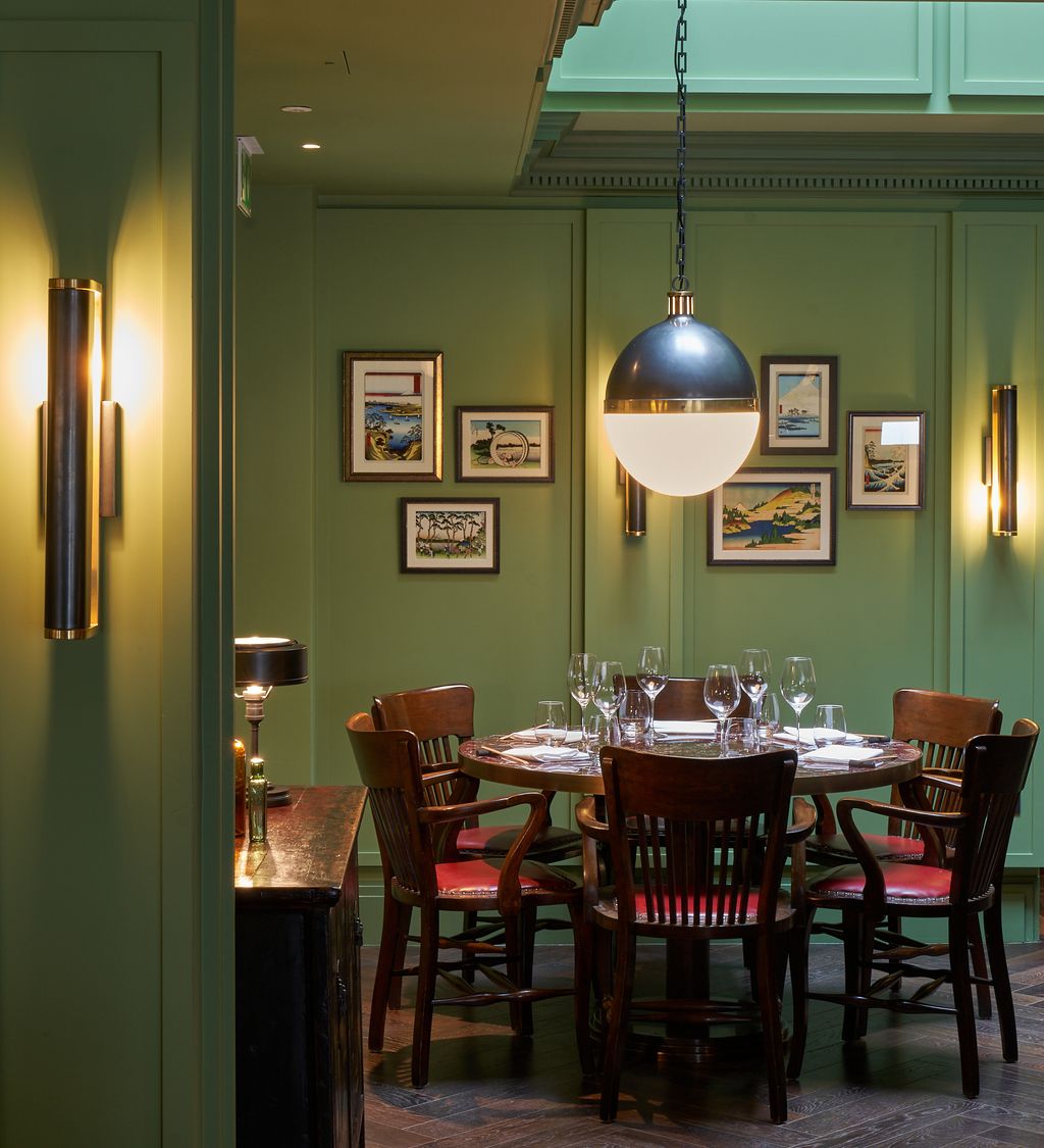 Image may contain Furniture Chair Lighting Room Indoors Dining Room Dining Table Table Interior Design and Flooring