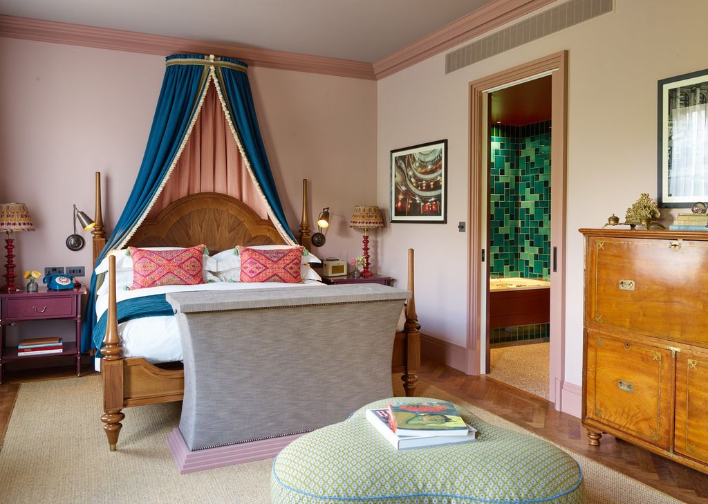 Image may contain Room Bedroom Indoors Furniture Interior Design Flooring Living Room Home Decor Bed and Corner