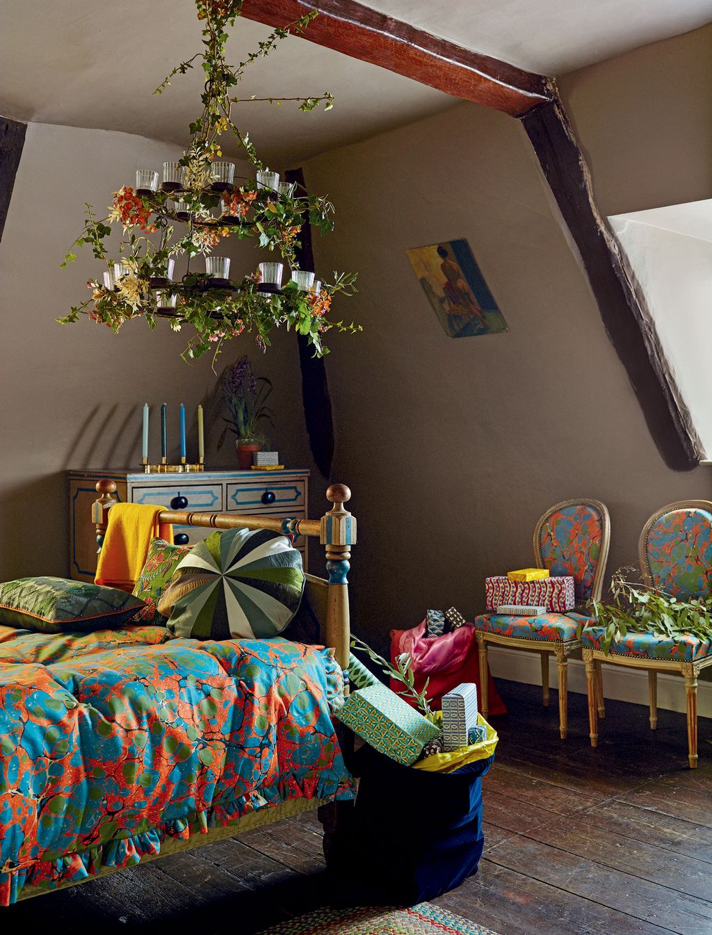 Image may contain Furniture Room Indoors Interior Design Bed Living Room Couch Plant Bedroom and Cushion