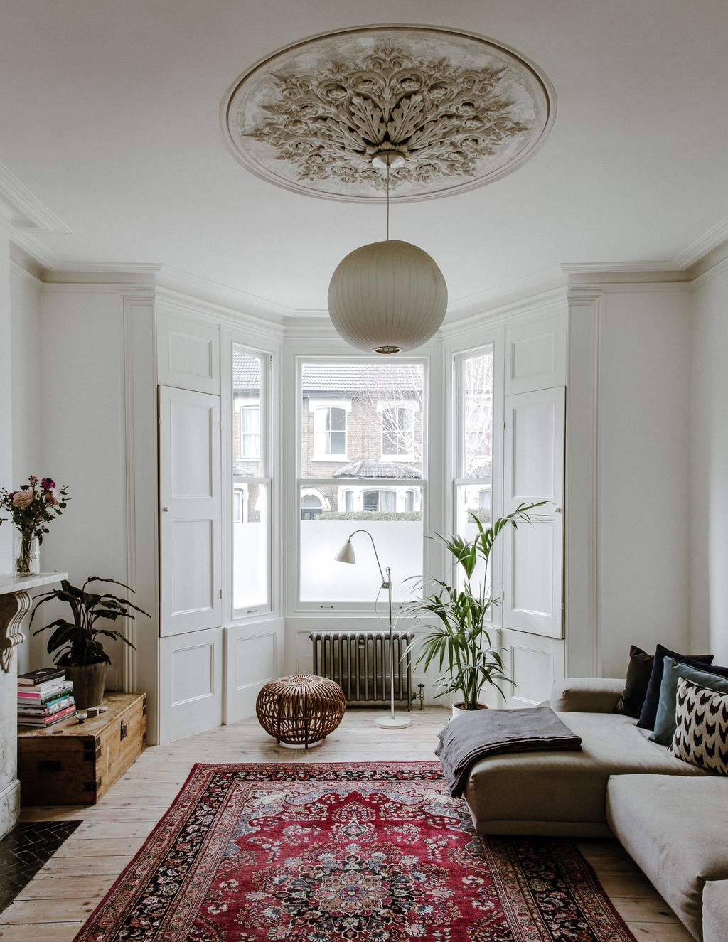 Image may contain Living Room Room Indoors Furniture Rug Interior Design Table and Couch
