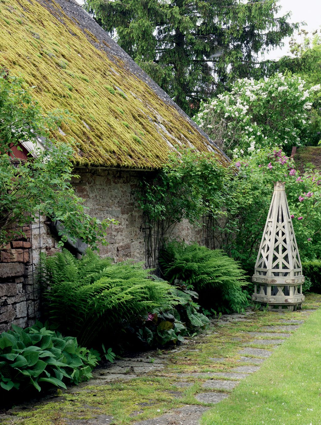 Image may contain Garden Arbour and Outdoors