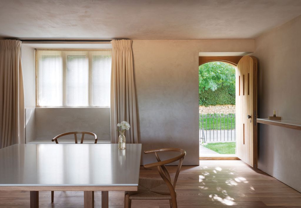 Image may contain Flooring Home Decor Wood Floor Hardwood Furniture Chair Interior Design Indoors and Table