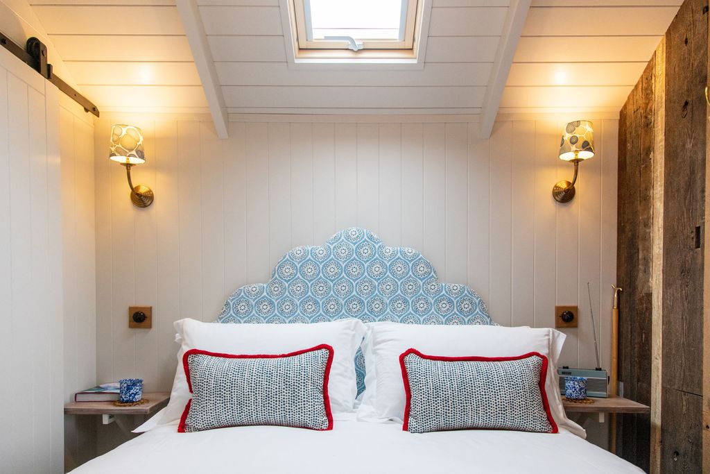 Image may contain Indoors Room Window Bedroom Interior Design Furniture Bed Building and Architecture