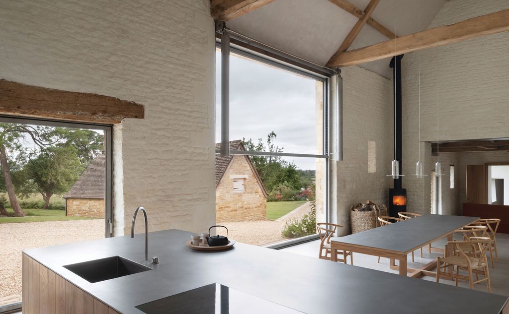 Image may contain Indoors Room Furniture Chair Wood Interior Design and Kitchen