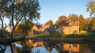 Image may contain Building Castle Architecture Fort Moat Outdoors Nature Water and Land
