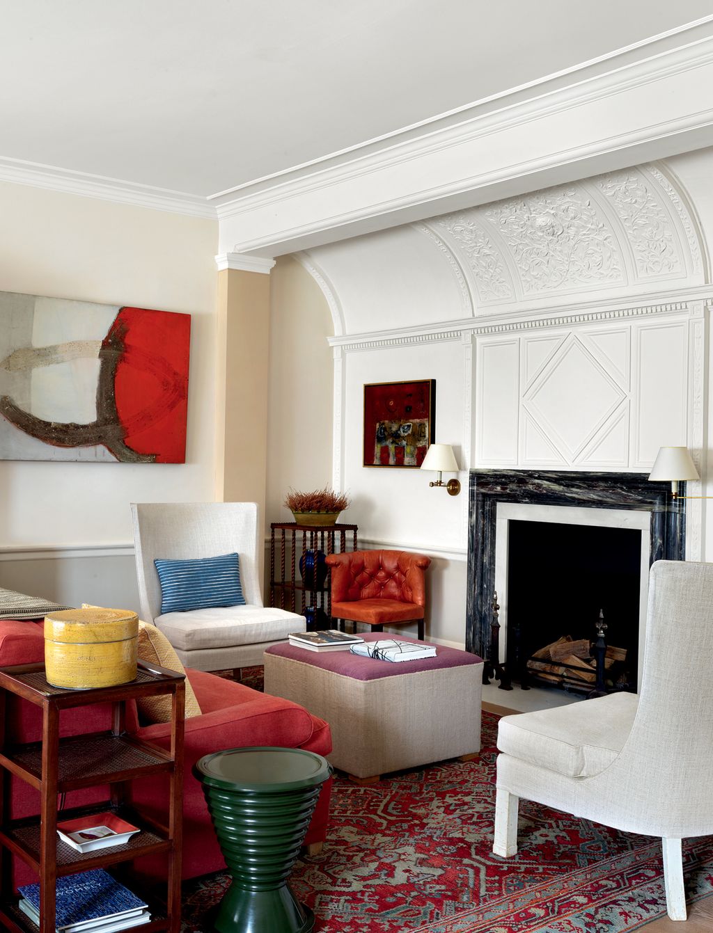 Image may contain Living Room Room Indoors Furniture Chair Interior Design Table Fireplace and Hearth