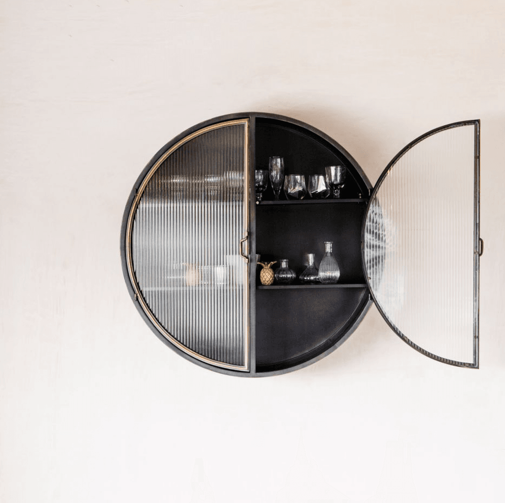 Image may contain Furniture Sunglasses Accessories Accessory Door and Glasses