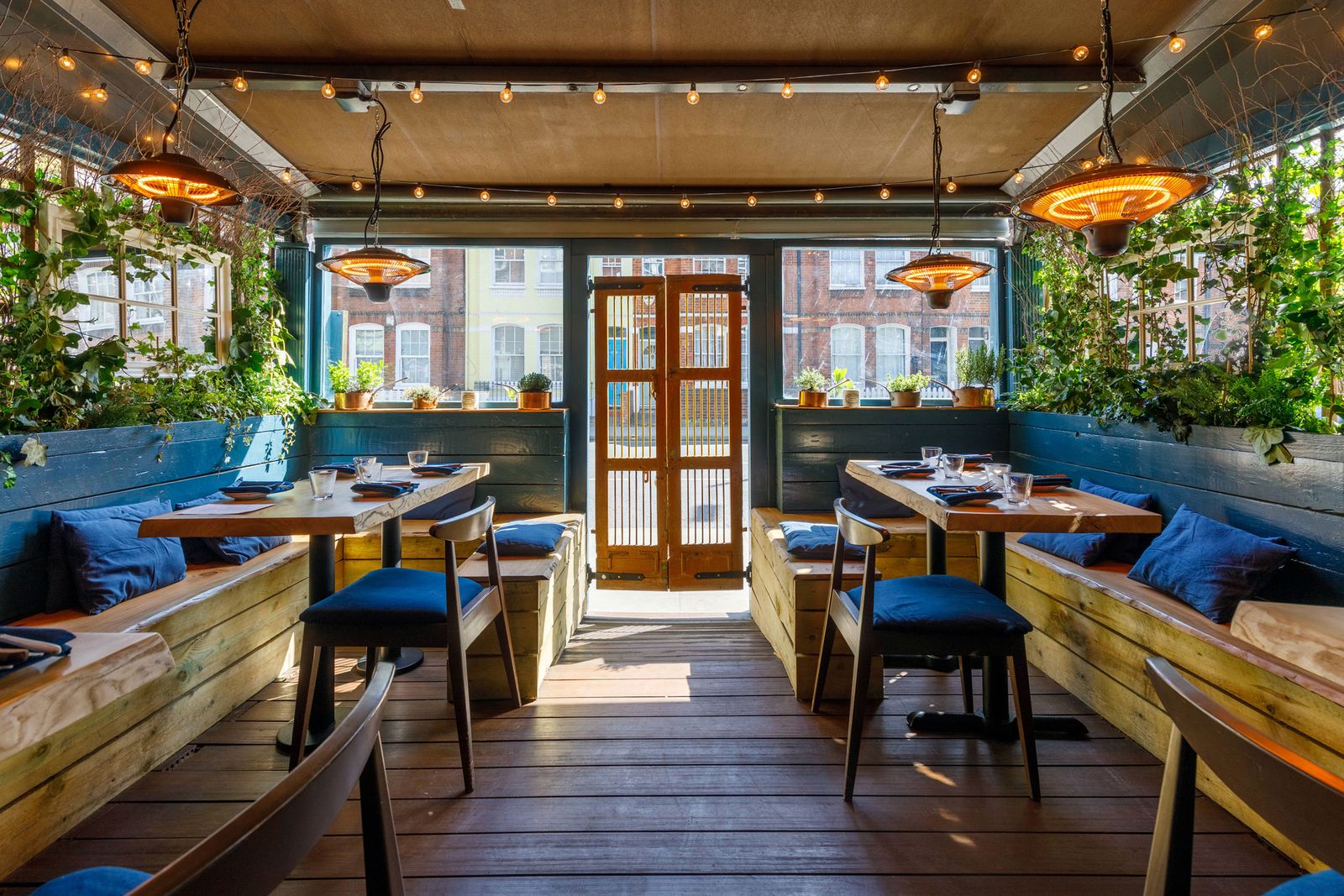 Image may contain Wood Restaurant Cafe Furniture Chair Hardwood Cafeteria Flooring Interior Design and Indoors