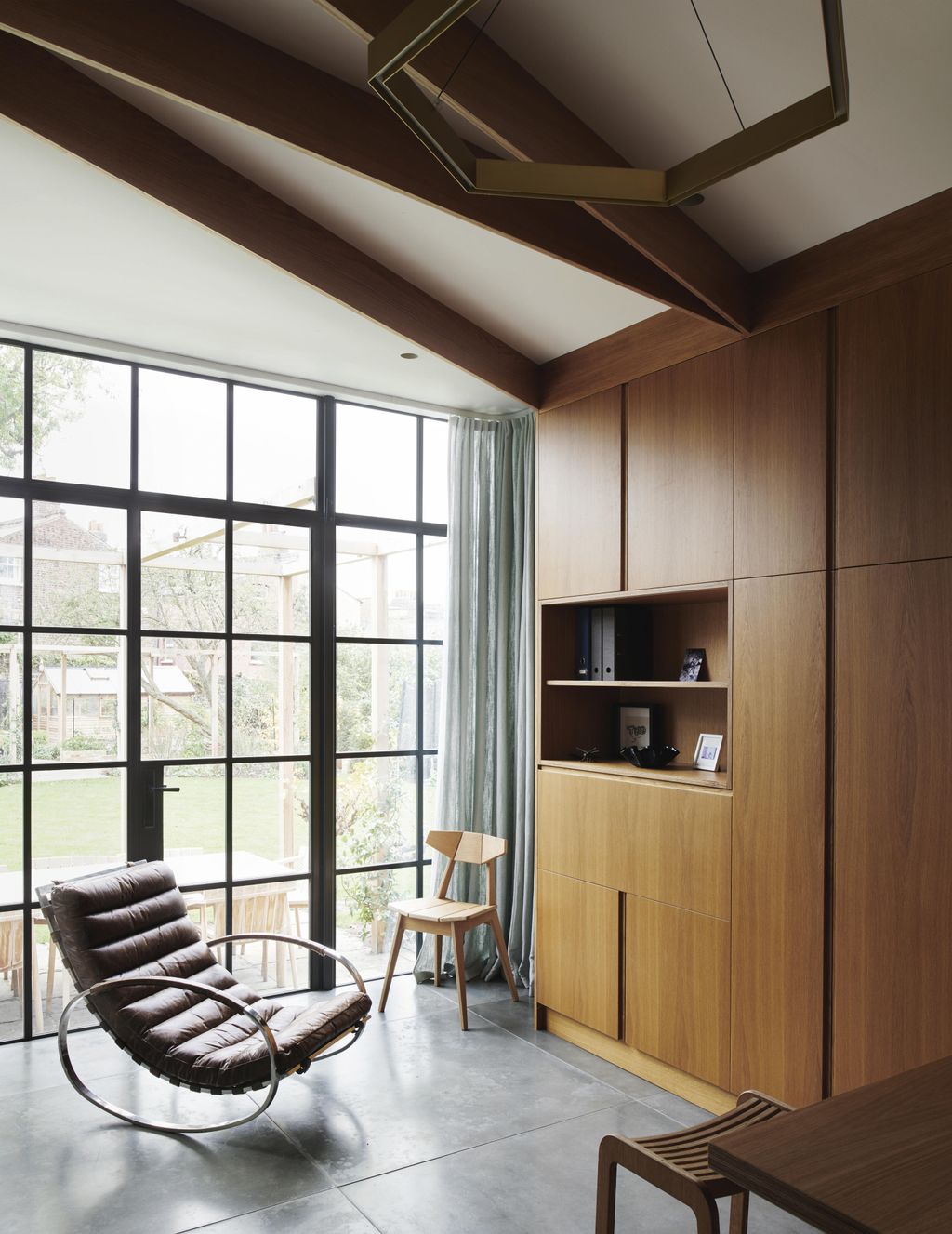 Image may contain Furniture Chair Building Housing and Wood