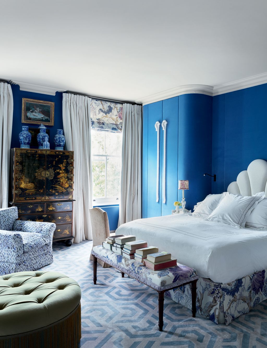 Image may contain Furniture Indoors Room Bedroom Bed Rug and Living Room