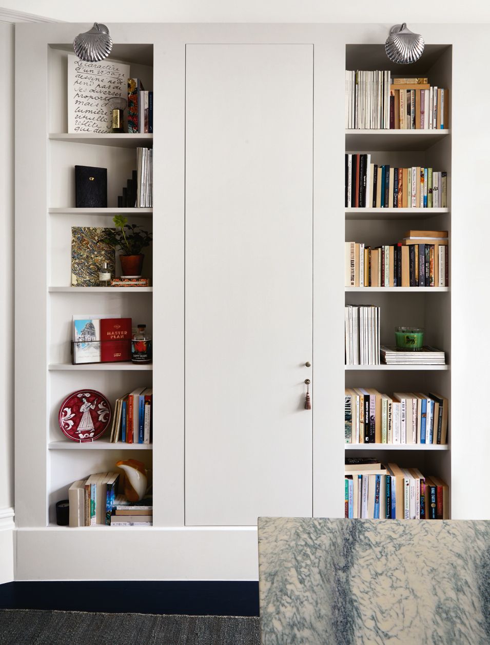 Image may contain Shelf Furniture and Bookcase