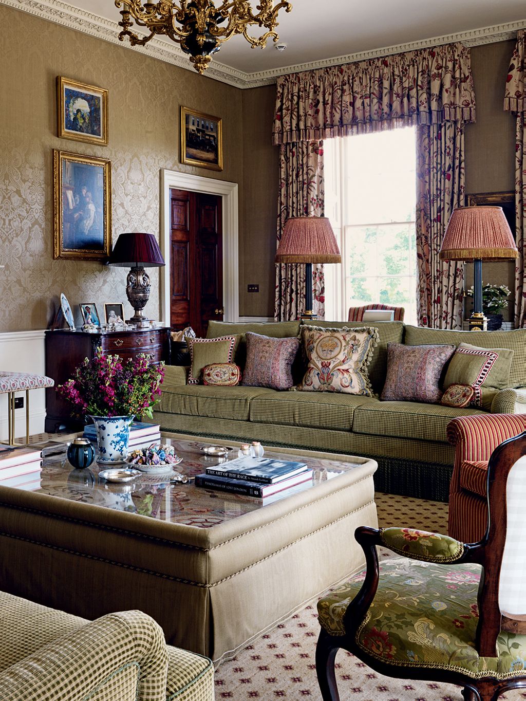 Image may contain Furniture Living Room Indoors Room Chair Couch Table and Rug