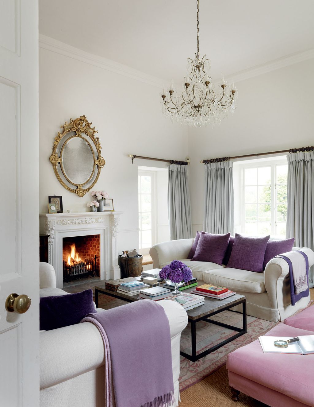 Image may contain Living Room Room Indoors Furniture Table Hearth Fireplace and Interior Design