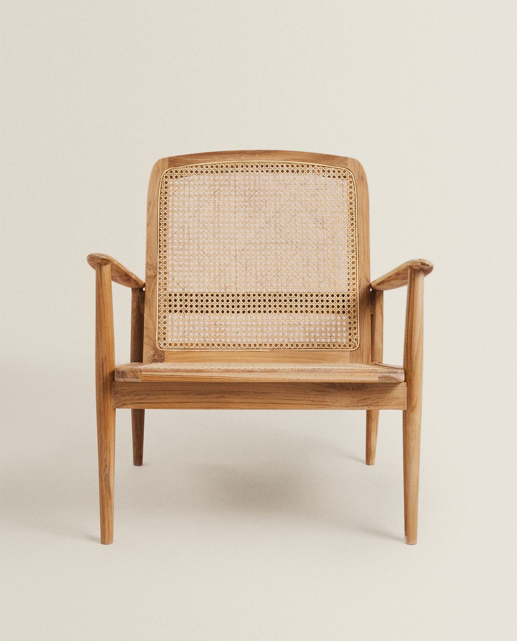 Teak and Rattan Armchair 299.99. buttongroup Shop now