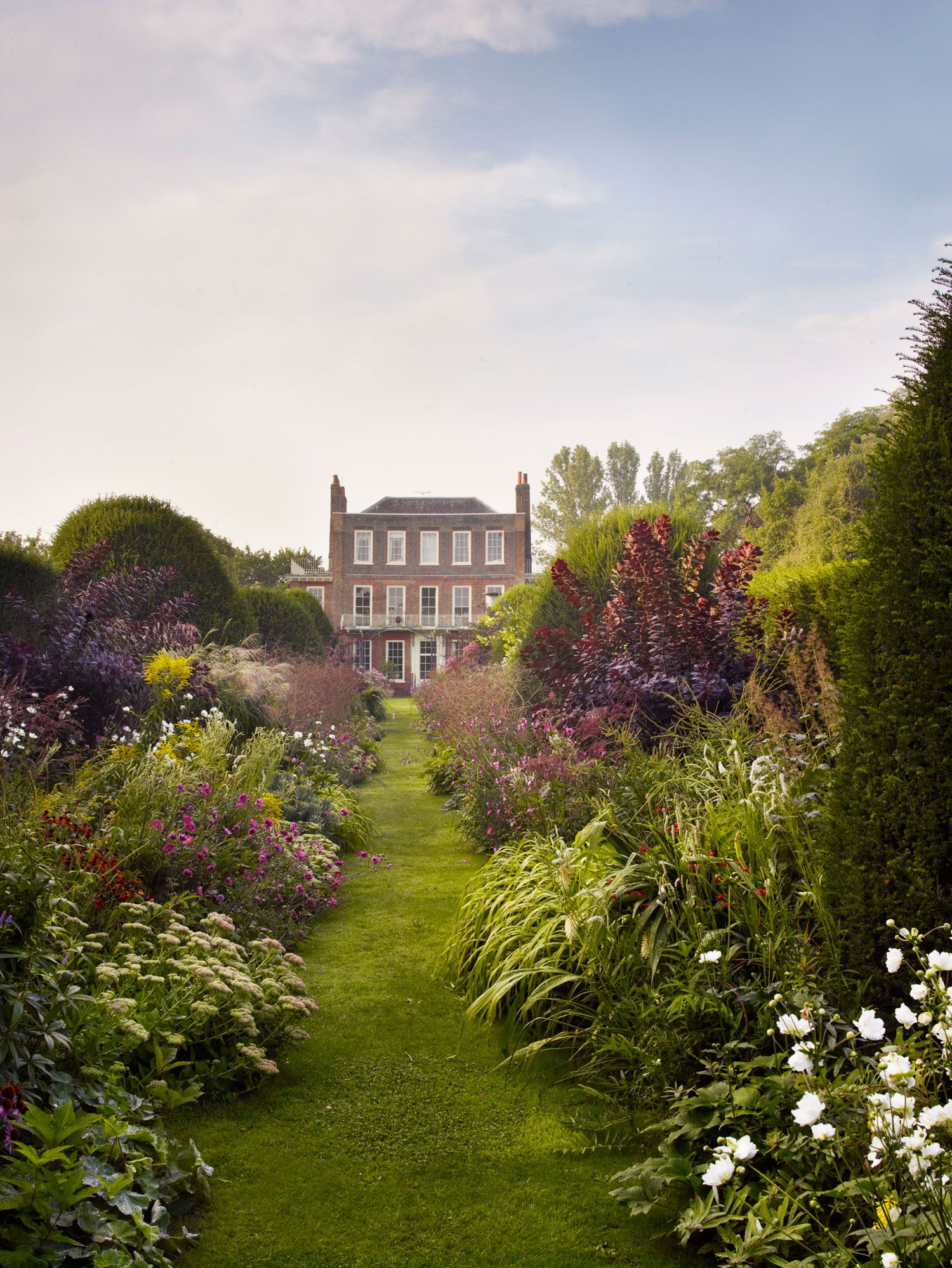 Image may contain Plant Grass Outdoors Garden Arbour Flower and Blossom