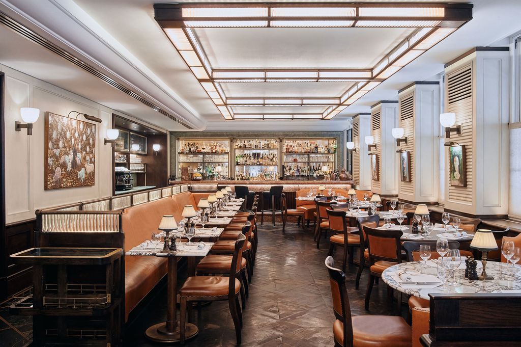 Image may contain Restaurant Furniture Chair Cafeteria Cafe Food Court and Food