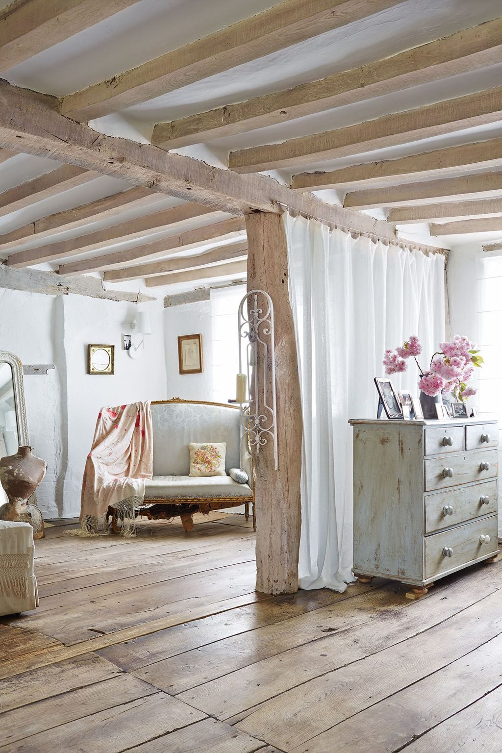 Image may contain Indoors Living Room Room Housing Building Interior Design Flooring Furniture and Wood