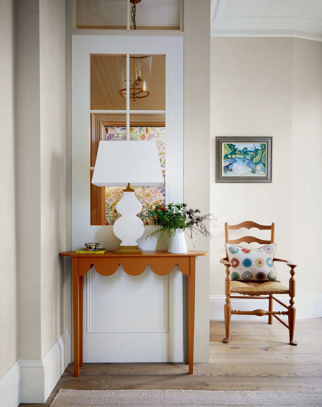 Image may contain Flooring Interior Design Indoors Corner Furniture Floor Hardwood Wood Living Room Room and Plant