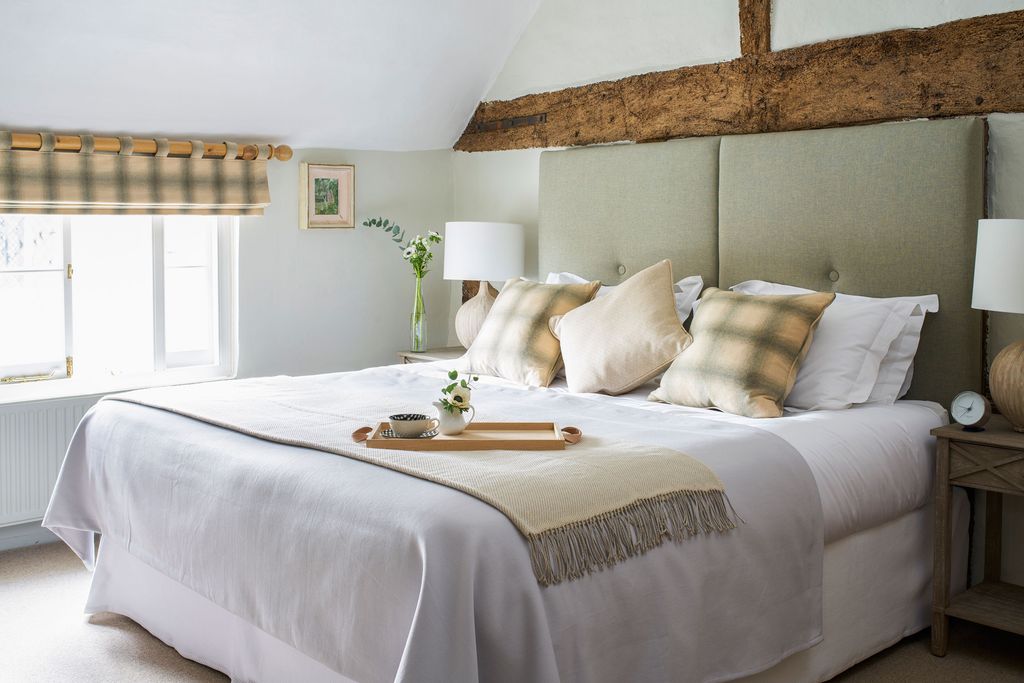 Image may contain Furniture Indoors Room Bedroom Interior Design Bed Building and Housing