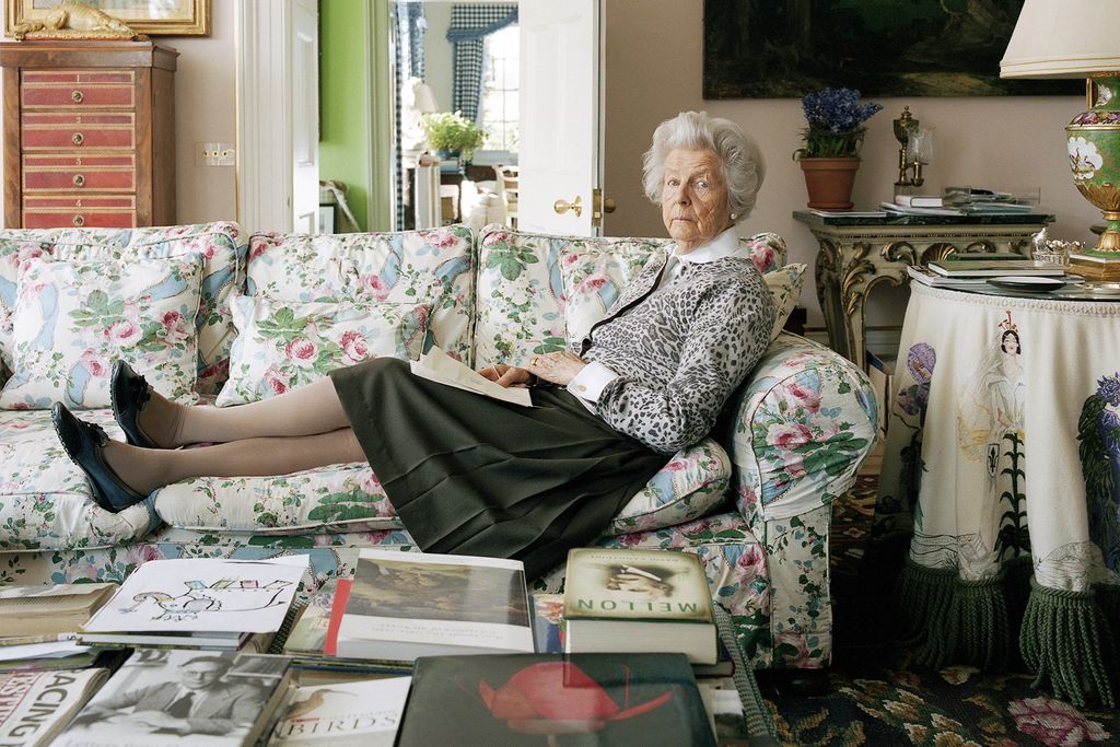 Image may contain Deborah Cavendish Duchess of Devonshire Furniture Couch Living Room Room Indoors Shelf and Human