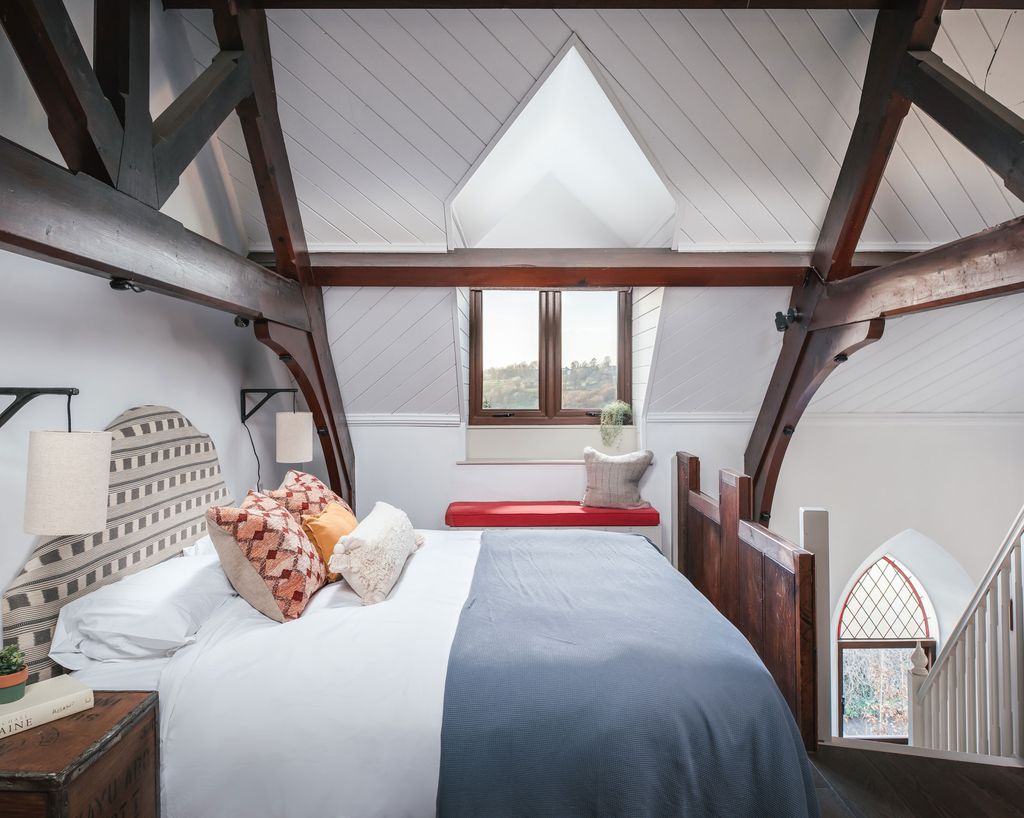 Set on the mezzanine level the bedroom features a super kingsize bed.