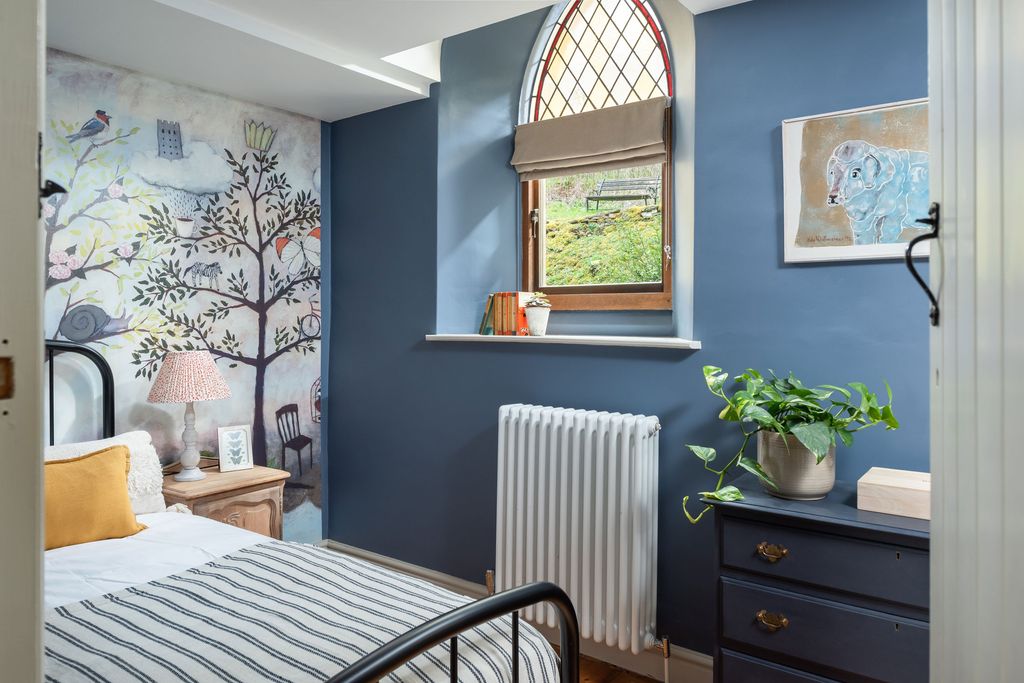 Image may contain Furniture Indoors Room Bed Bedroom and Interior Design