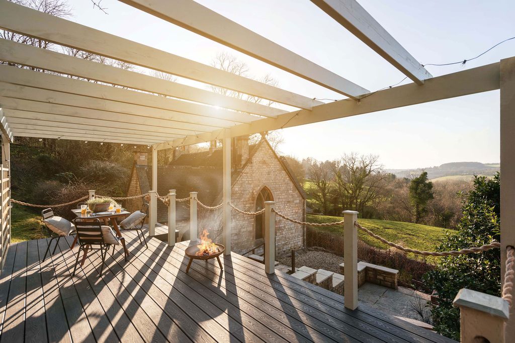 The garden has different levels with the highest part offering a sun deck with dining and reclining areas.