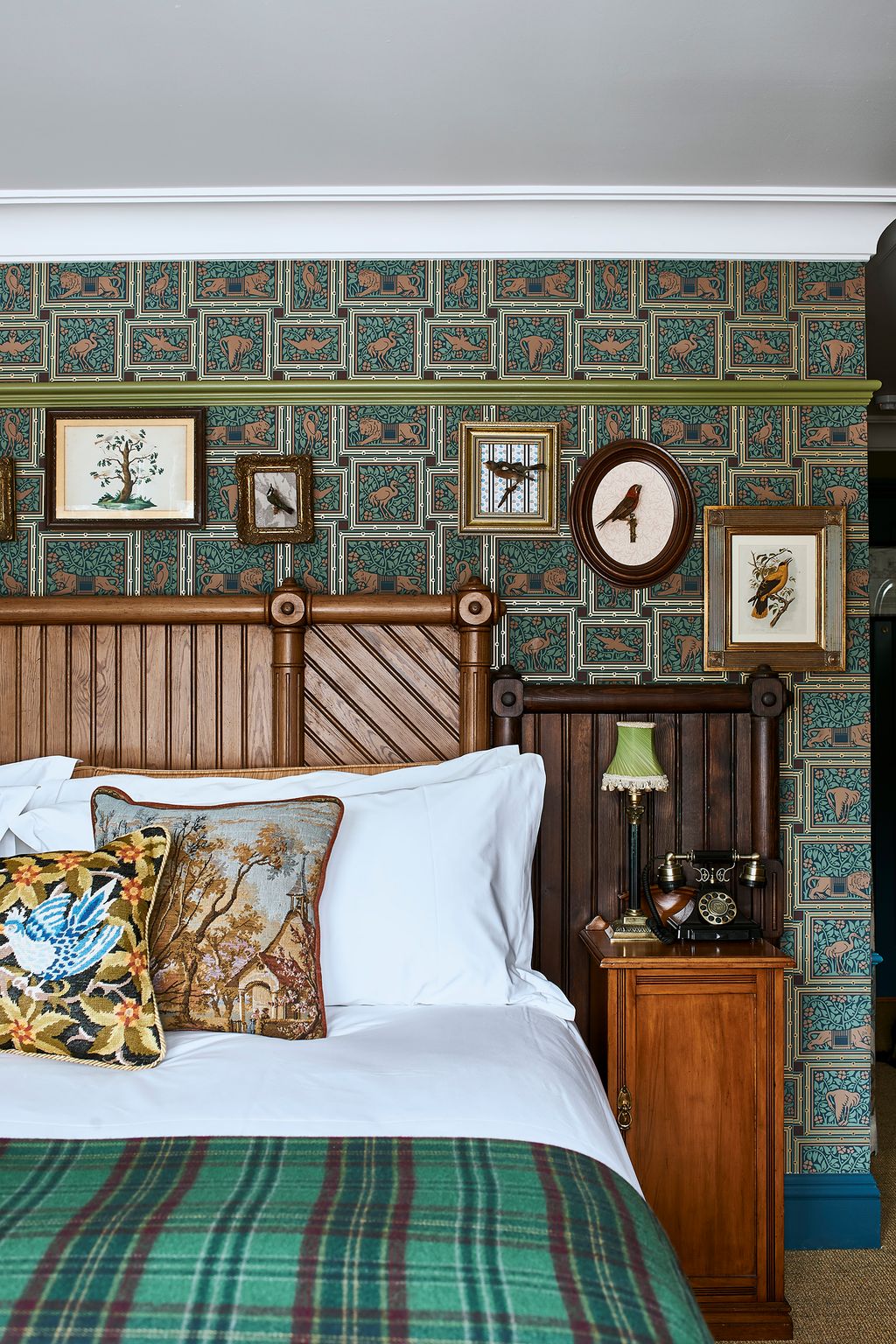 Image may contain Cushion Pillow Furniture Home Decor Bed Interior Design Indoors Room Bedroom and Clock Tower