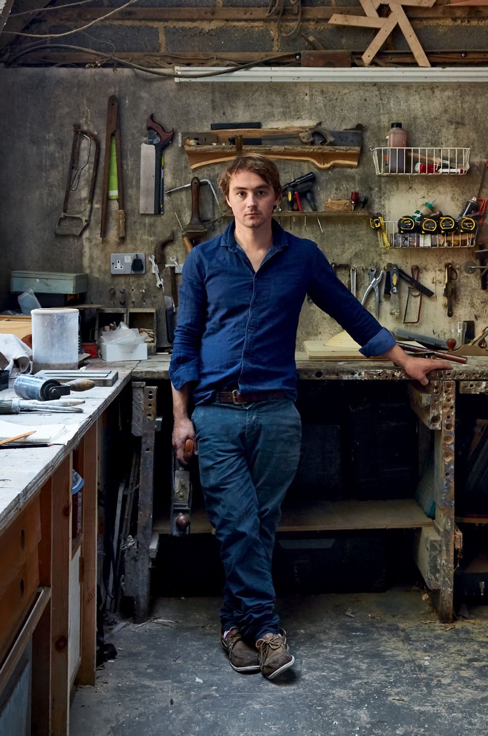 Image may contain Human Person Clothing Shoe Footwear Apparel Pants Plywood Wood and Machine