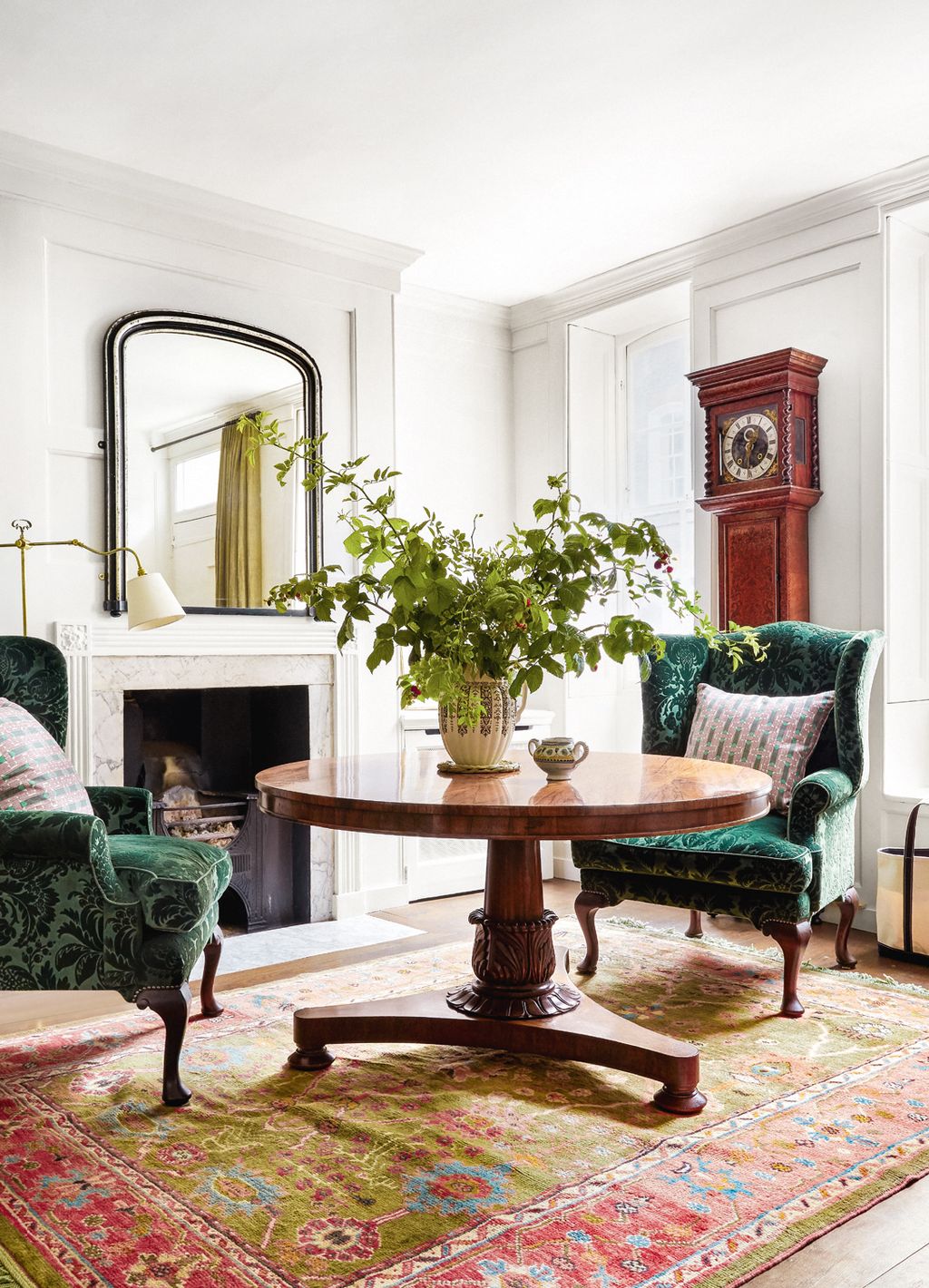 Damasks can also make an appealing addition to a simpler interior. In this hallway of a house decorated by Ben Pentreath...