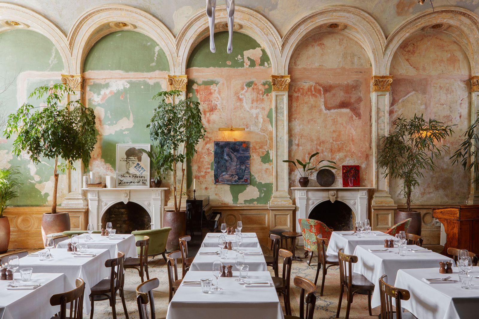 Image may contain Restaurant Furniture Chair Cafe Cafeteria Dining Table Table Indoors Food Court and Food