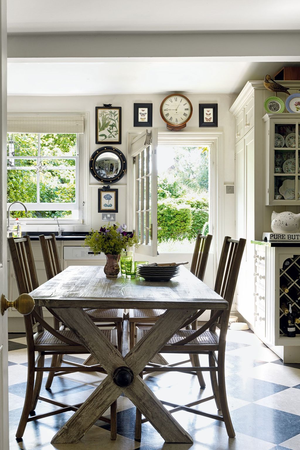 Image may contain Furniture Chair Room Indoors Dining Room Table Dining Table Interior Design and Living Room