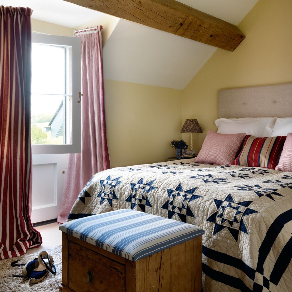 Image may contain Room Bedroom Indoors Furniture Bed Interior Design Flooring and Home Decor