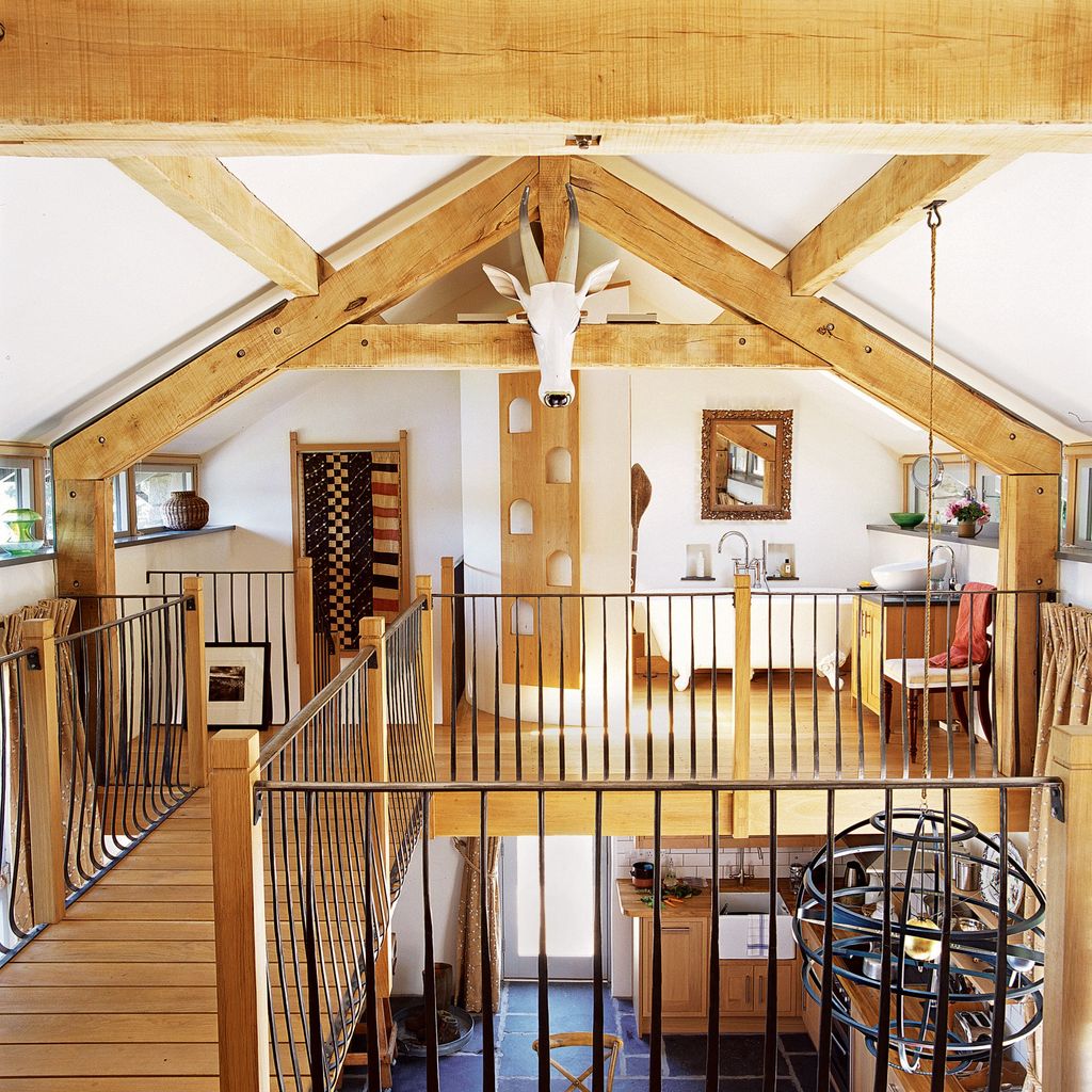Image may contain Housing Building Interior Design Indoors Loft Banister Handrail and Wood