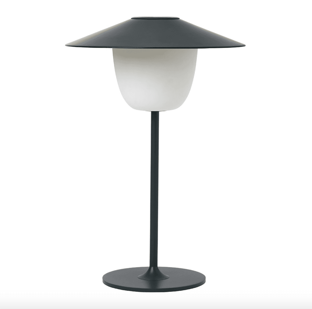 Image may contain Lamp Table Lamp and Lampshade