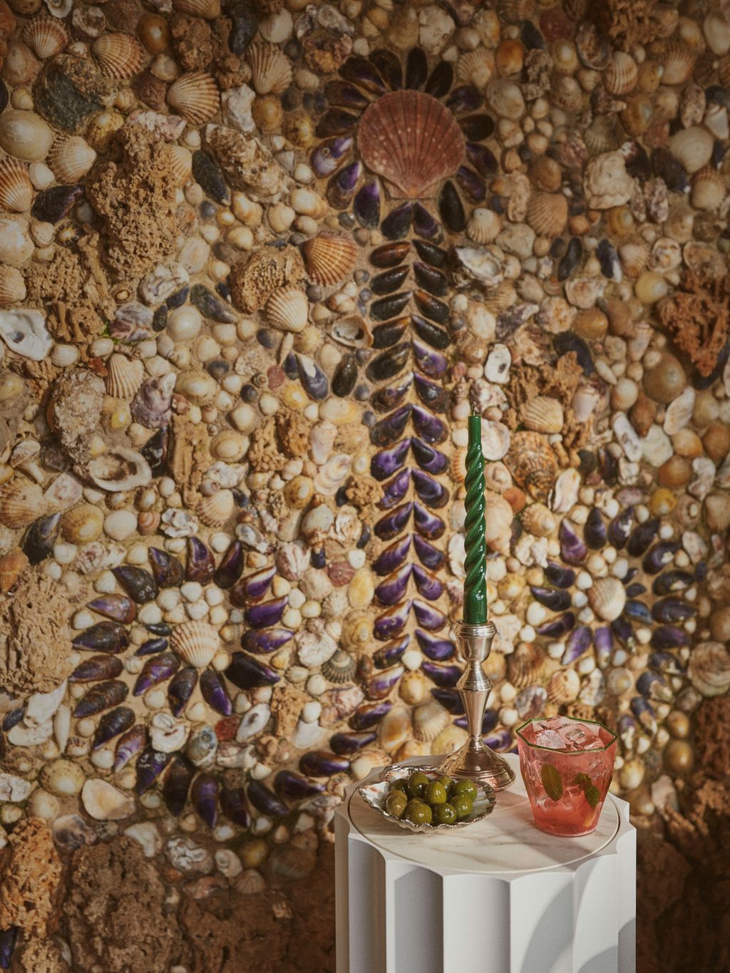 Candles from Edition 94 and Anna Nina mix with Campbell Rey Murano glasses and a Matilda Goad clam shell.