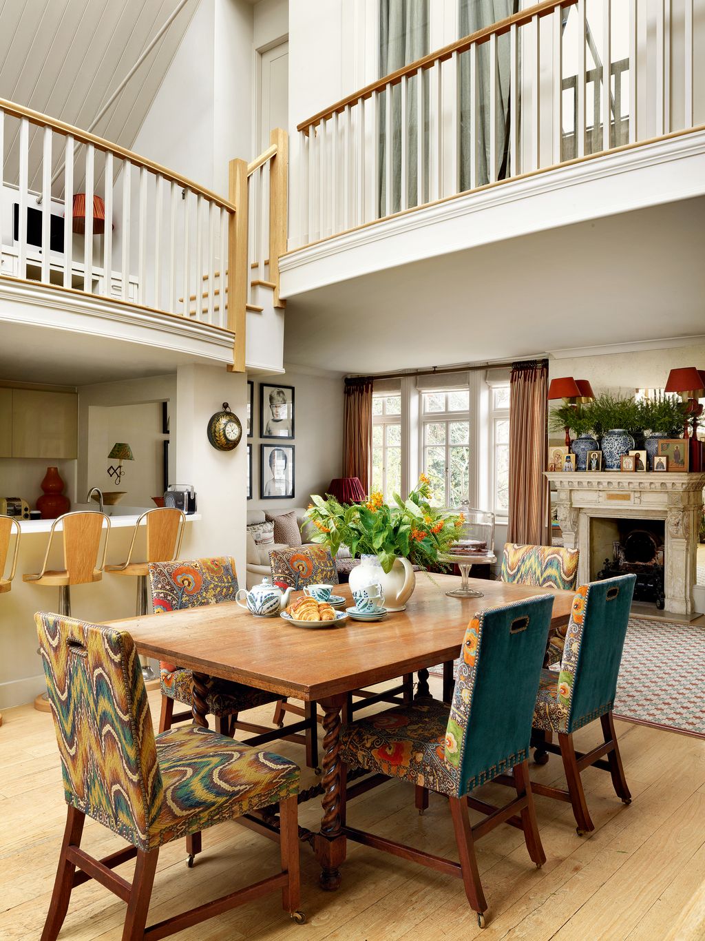 Image may contain Furniture Chair Indoors Room Interior Design Living Room Wood Dining Room Flooring and Hardwood