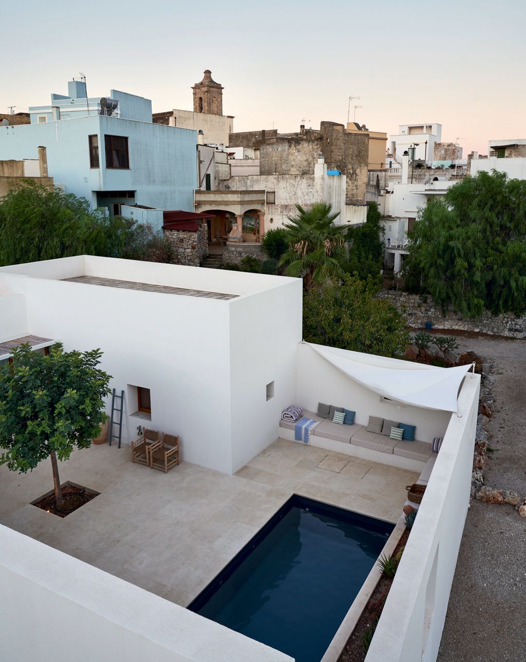 Image may contain Housing Building Plant Tree Banister Handrail Flooring Villa and House