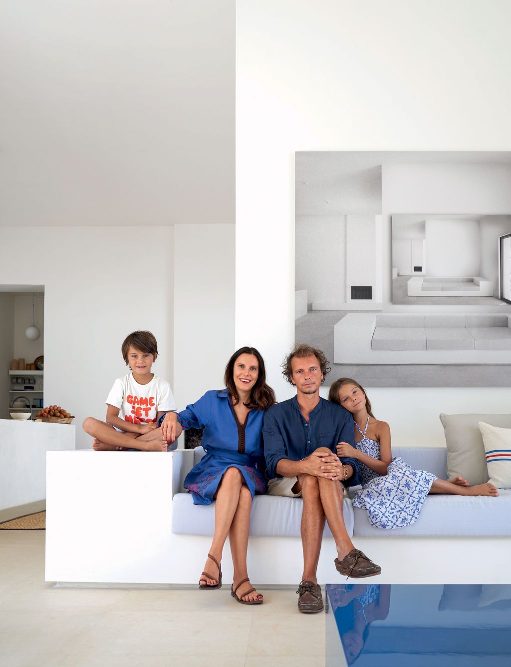 Image may contain Human Person Footwear Clothing Shoe Apparel Furniture Sitting Living Room Room and Indoors