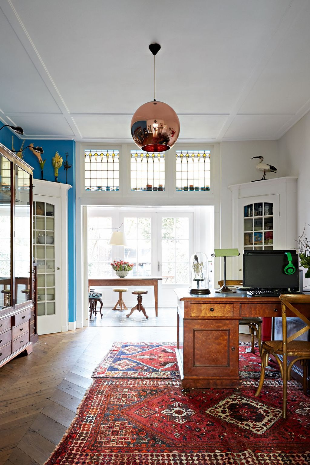 Image may contain Furniture Indoors Room Interior Design Chair Rug Table and Living Room