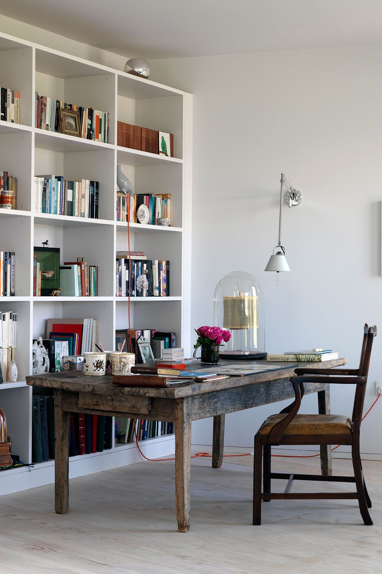 Image may contain Furniture Chair Table Shelf Bookcase Dining Table and Desk