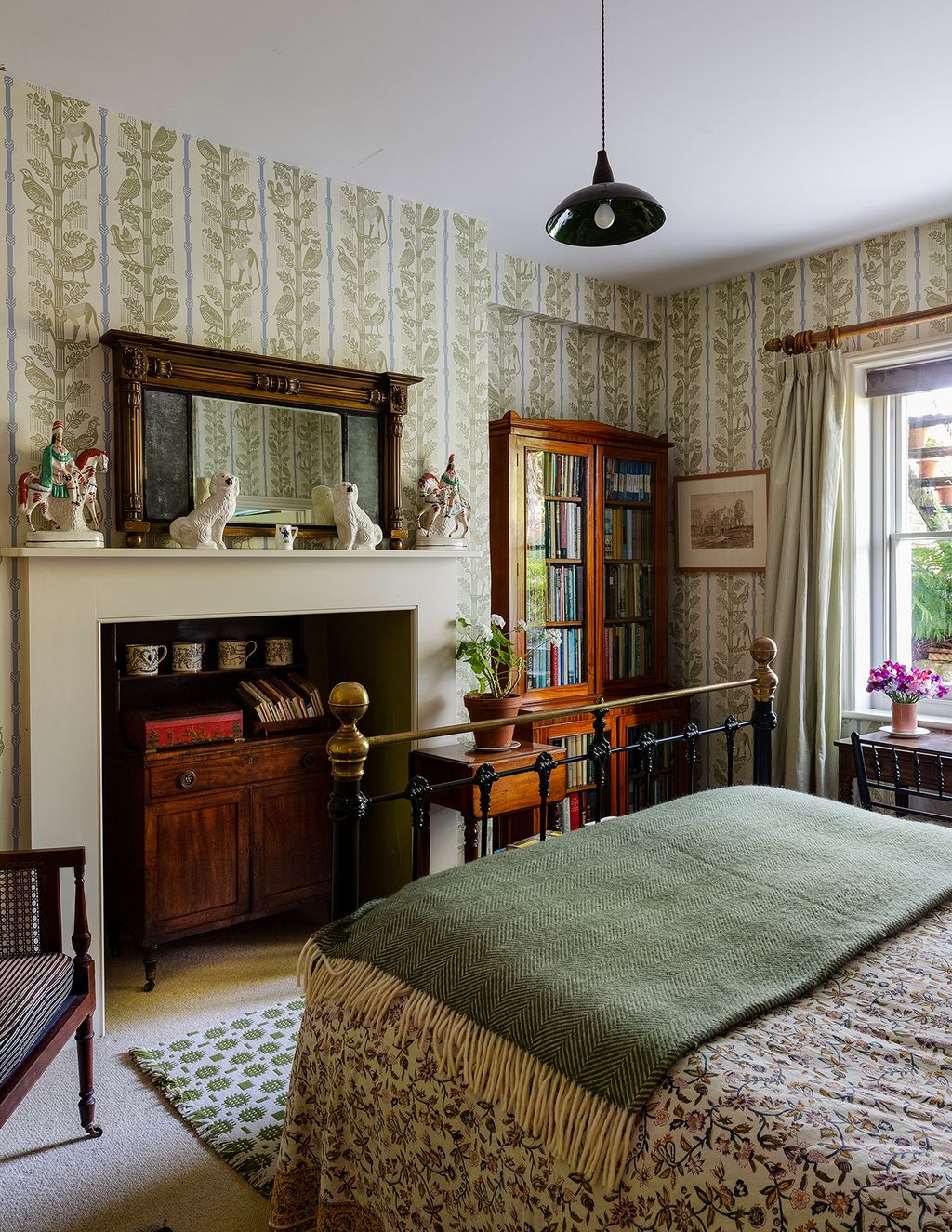 Image may contain Furniture Room Indoors Living Room Bedroom Interior Design Wood Rug and Shelf