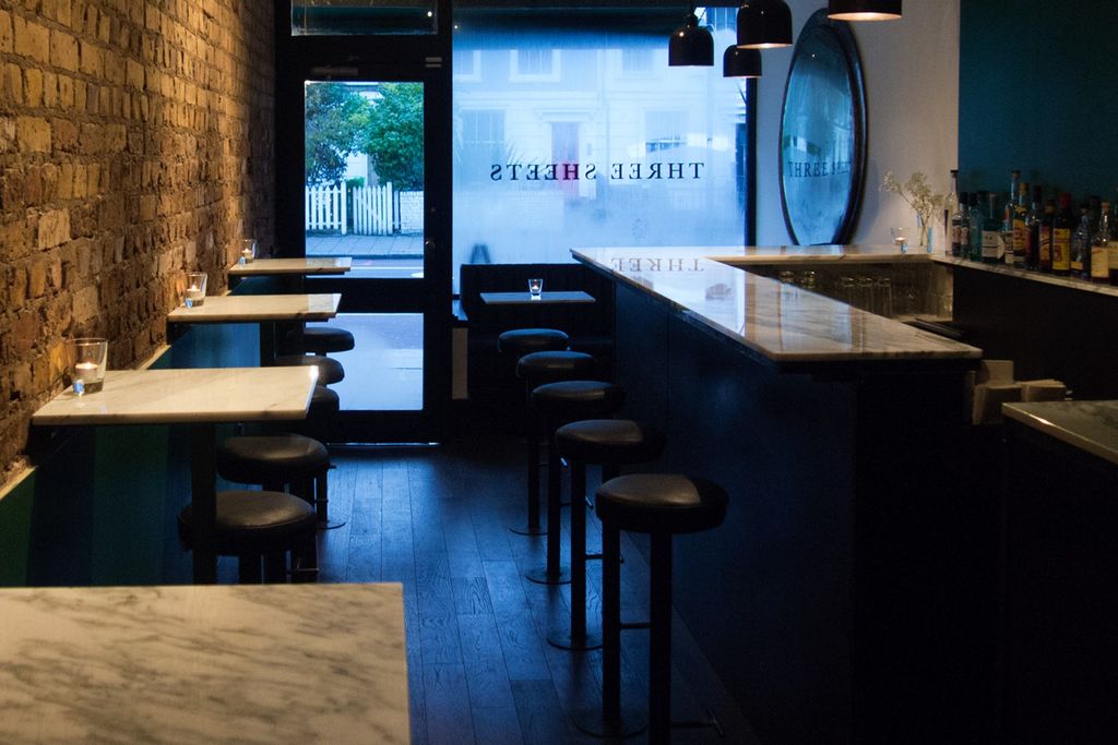 Image may contain Furniture Chair Wood Pub Bar Counter Restaurant and Hardwood