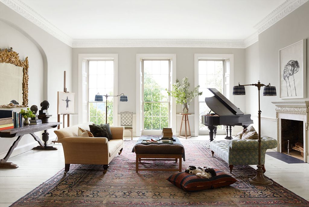 On the nineteenthcentury Persian carpet Christopher Howes ‘Weimaraner Sofa and ‘Gainsborough Stool are joined by an...