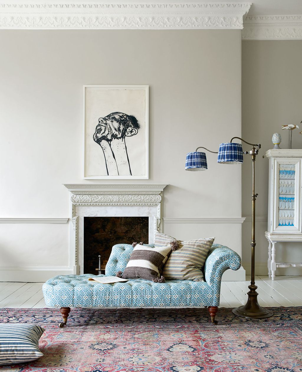 Image may contain Furniture Living Room Indoors Room Couch Interior Design Cushion and Pillow
