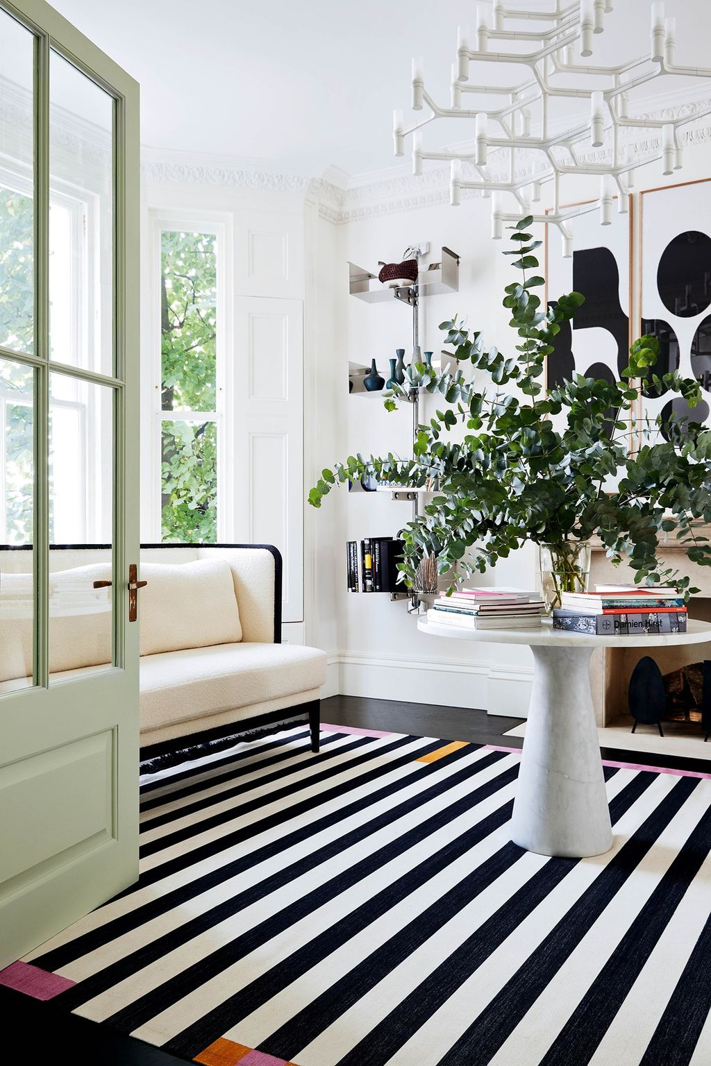 Image may contain Rug and Plant