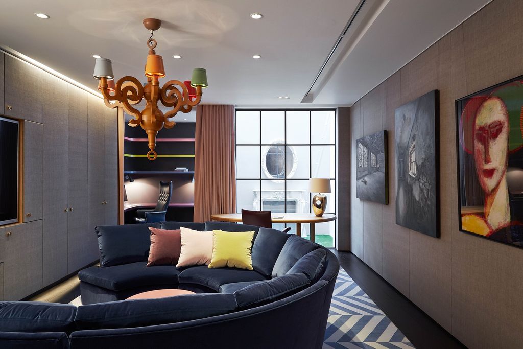 Image may contain Living Room Room Indoors Interior Design Furniture Lamp Chandelier Marie Laurencin and Bedroom